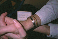 Engagement bracelet, haiku in background
